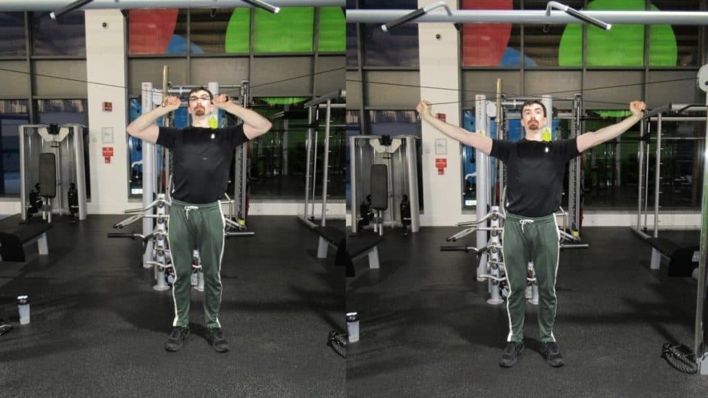 A man doing a single arm cable tricep extension