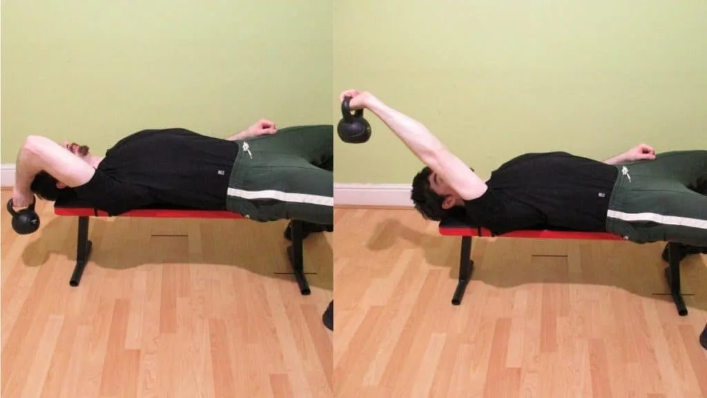 A man performing a single arm kettlebell skull crusher