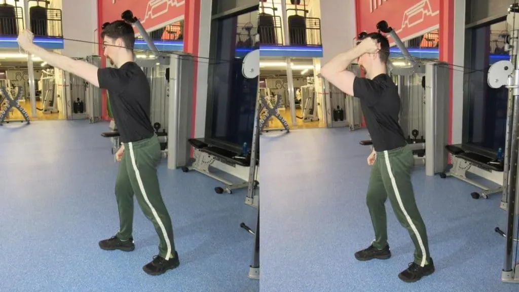 A man performing a single arm tricep extension with cables