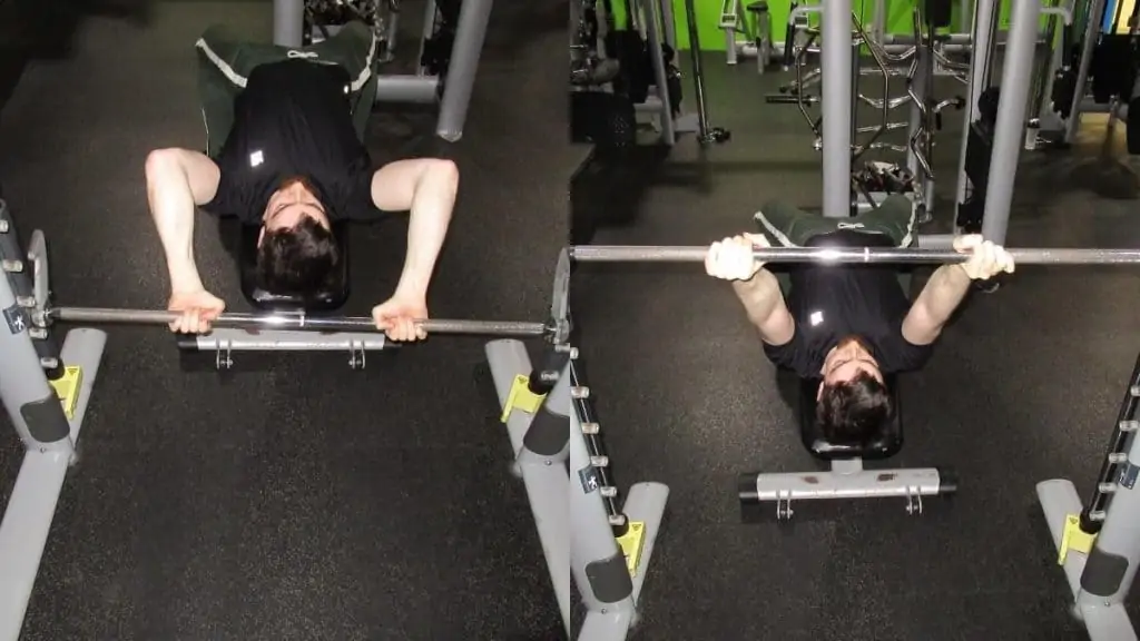 A man doing skull crushers on the Smith machine