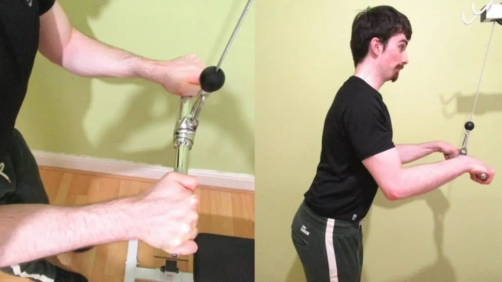 A man performing a straight bar cable press down for his triceps