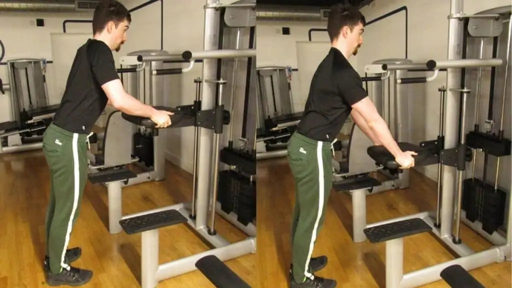 A man performing a tricep pushdown on an assisted pull up machine