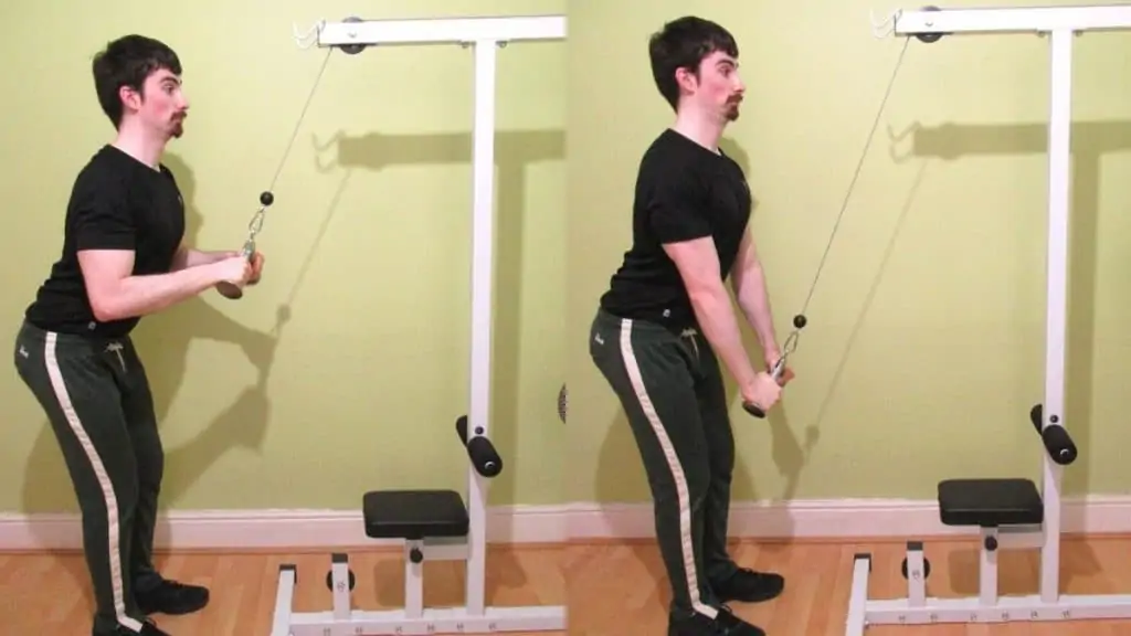 A man doing a tricep v bar pushdown