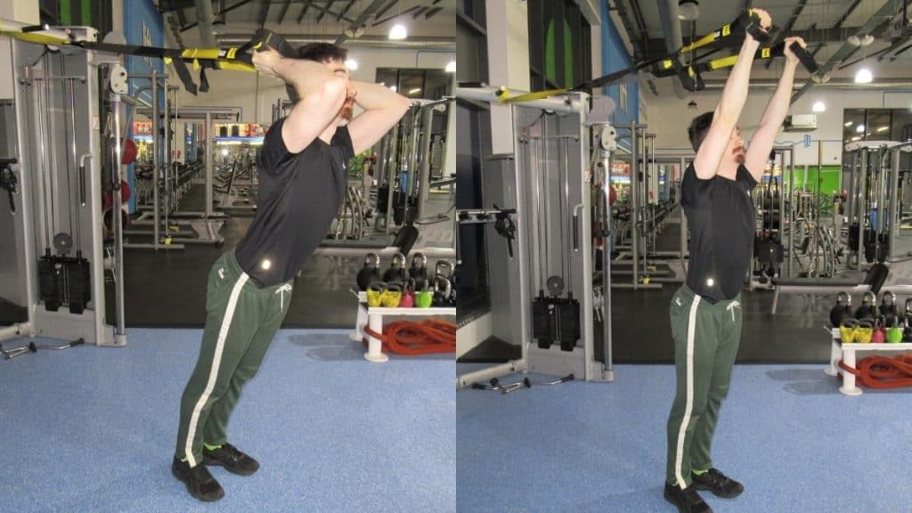 A man performing a TRX French press for his triceps