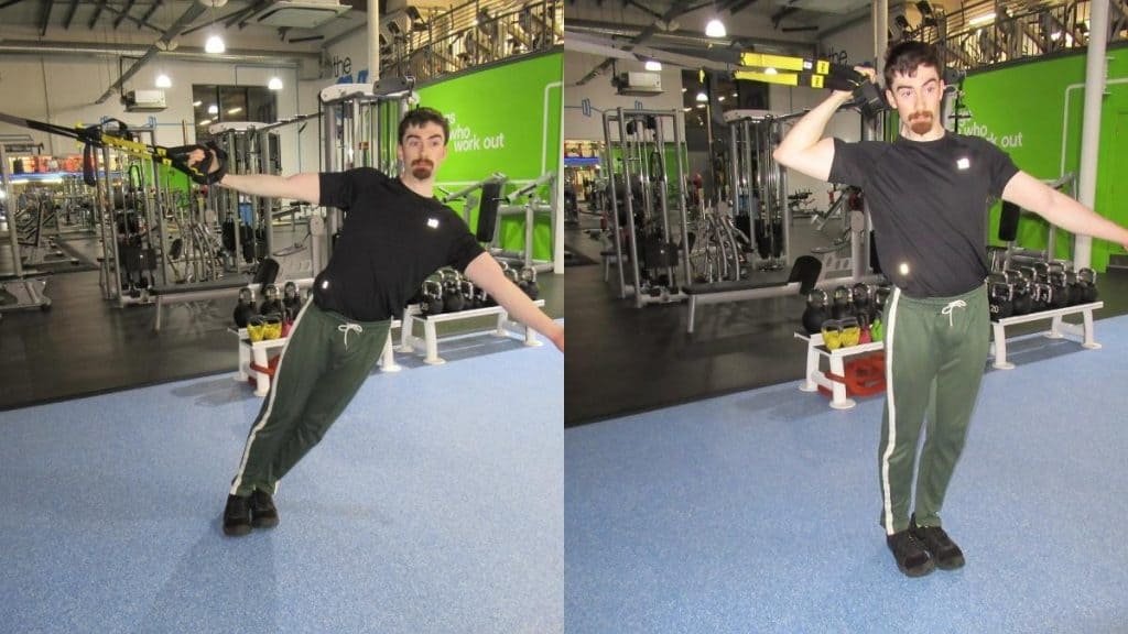 A man doing a one arm TRX side bicep curl