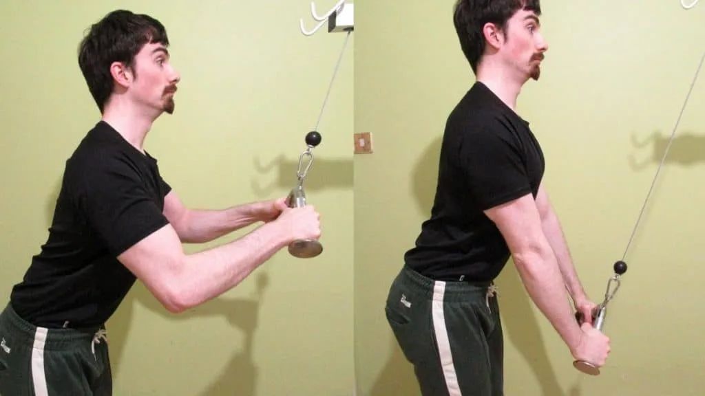 A man performing a v grip tricep pushdown