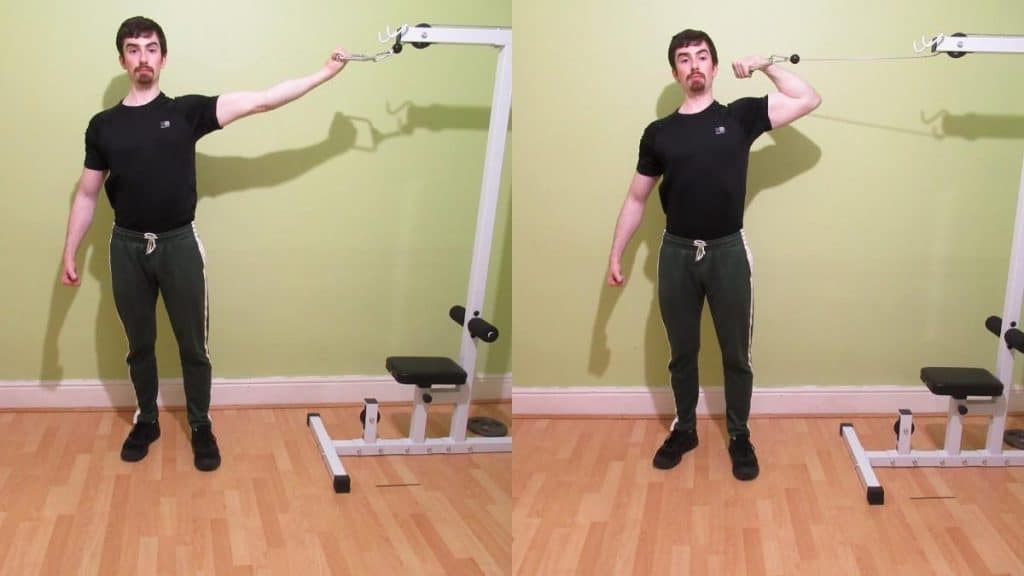 A man doing a 1 arm high cable curl