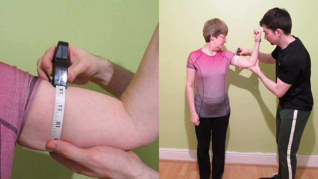 A female flexing her 12 inch arms