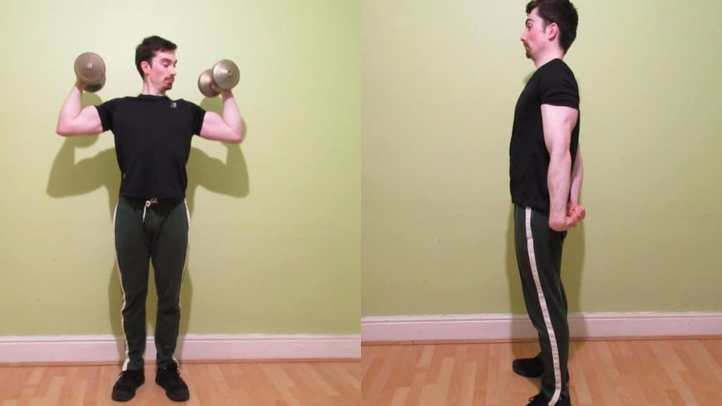 A man posing his 16 in biceps