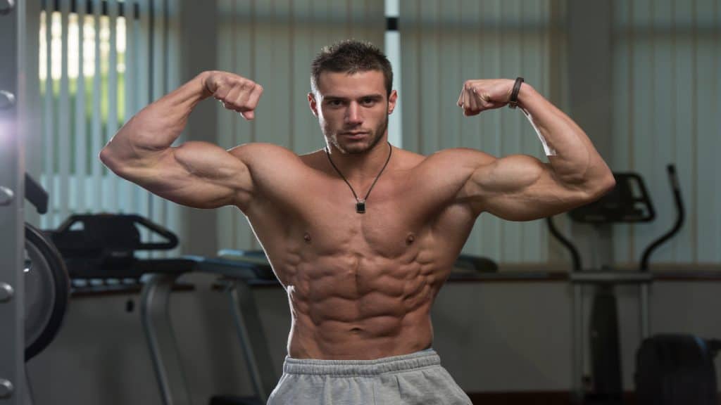 A bodybuilding showing his natural 19 inch arms