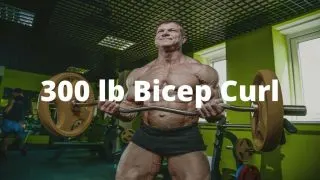 A bodybuilder performing a 300 lb bicep curl with a barbell