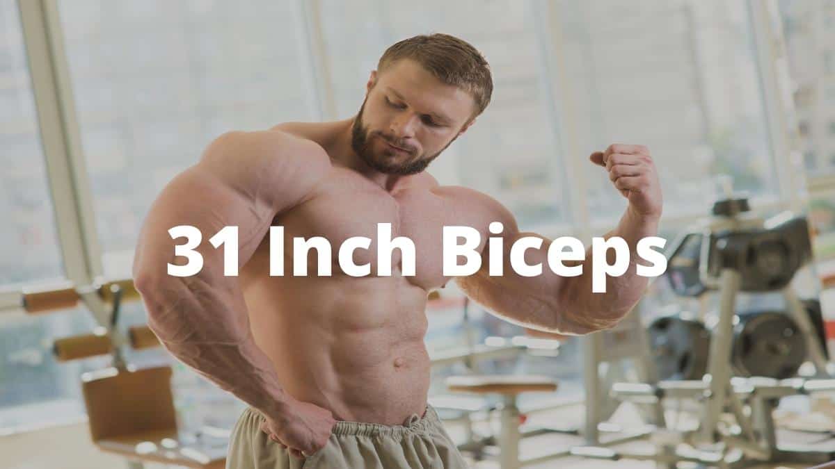 A bodybuilder flexing his 31 inch biceps