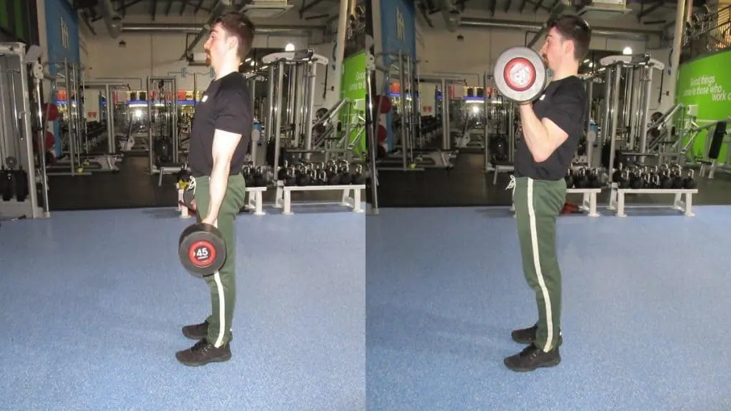 A man performing a 45 kg barbell curl for his biceps