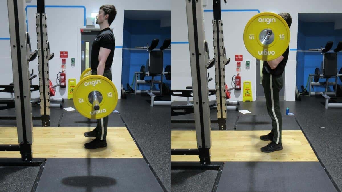 A man doing a 50 kg bicep curl with a barbell