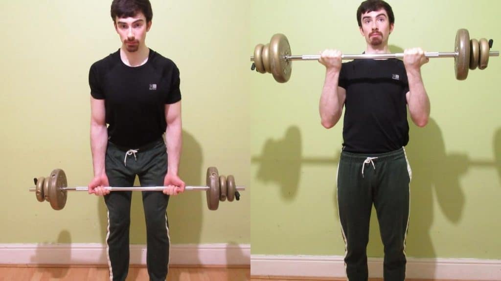 A man performing barbell Arnold cheat curls to work his biceps