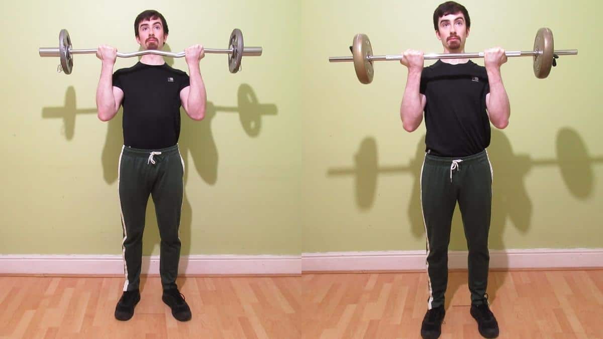 A man performing a barbell curl vs EZ bar curl comparison to show the differences