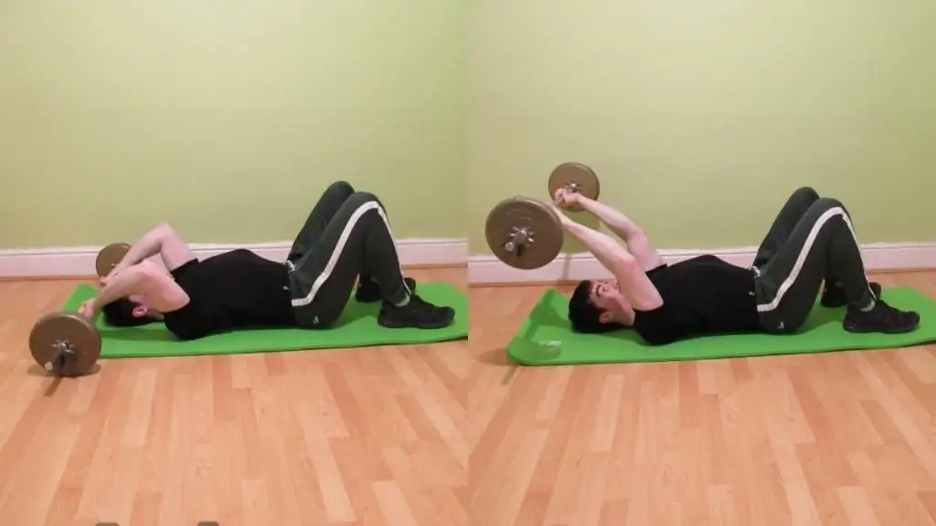 A man doing a barbell floor tricep extension