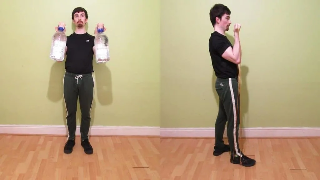 A man demonstrating the best bicep workout that you can do at home to build muscle