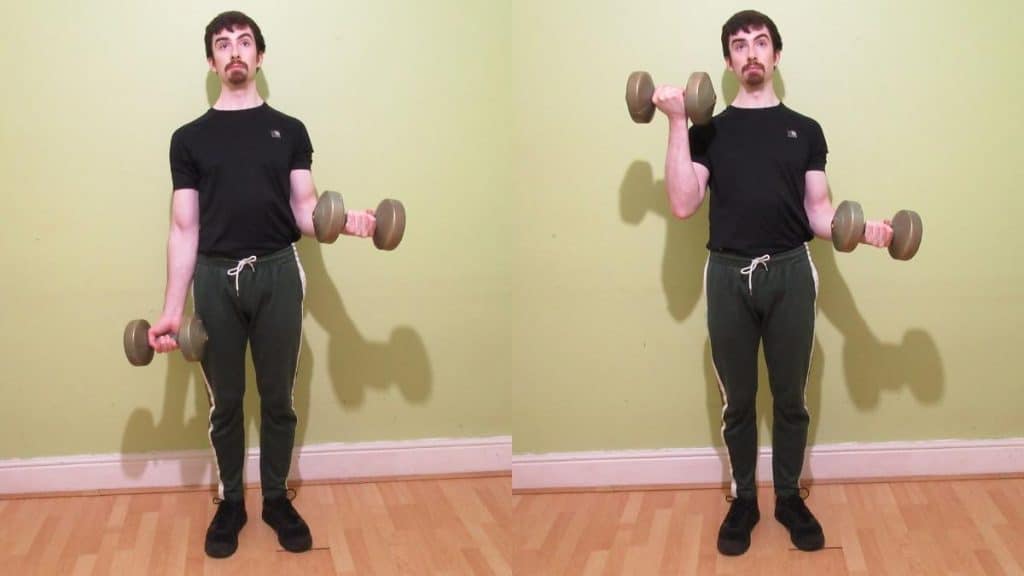 A man doing some isometric bicep curl holds