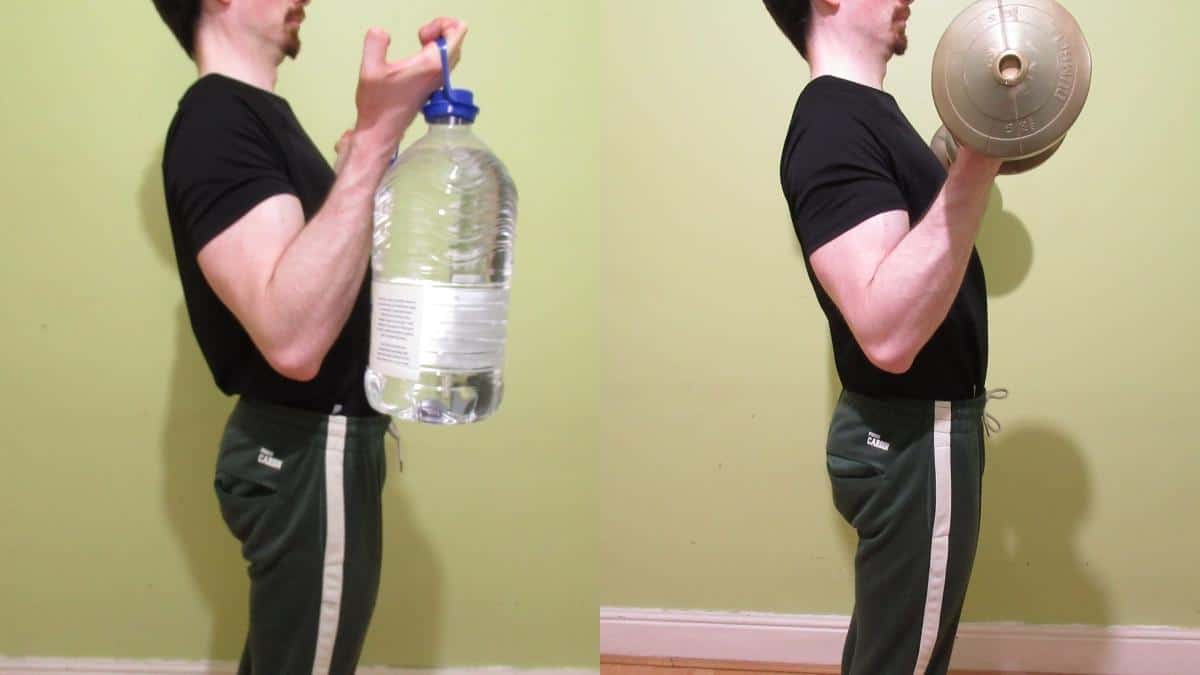 A man performing some bicep workouts at home