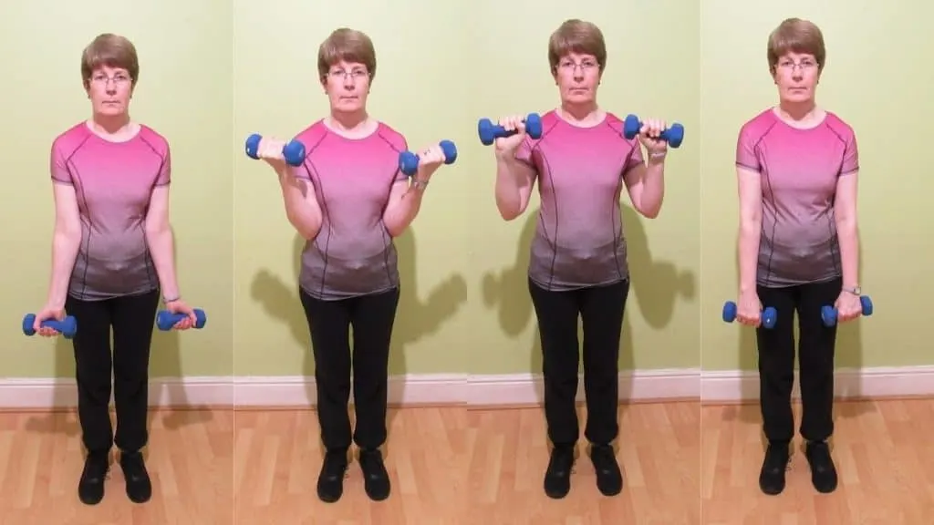 A woman lifting weights for her biceps during her workout