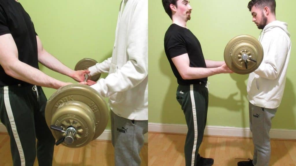 A man doing buddy bicep curls with his training partner