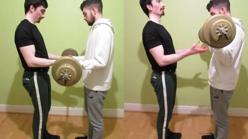 Two weight lifters doing buddy curls for their biceps