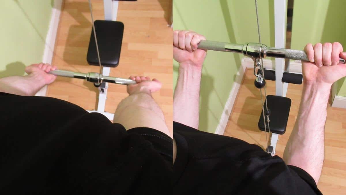 A man performing cable bar curls for his biceps
