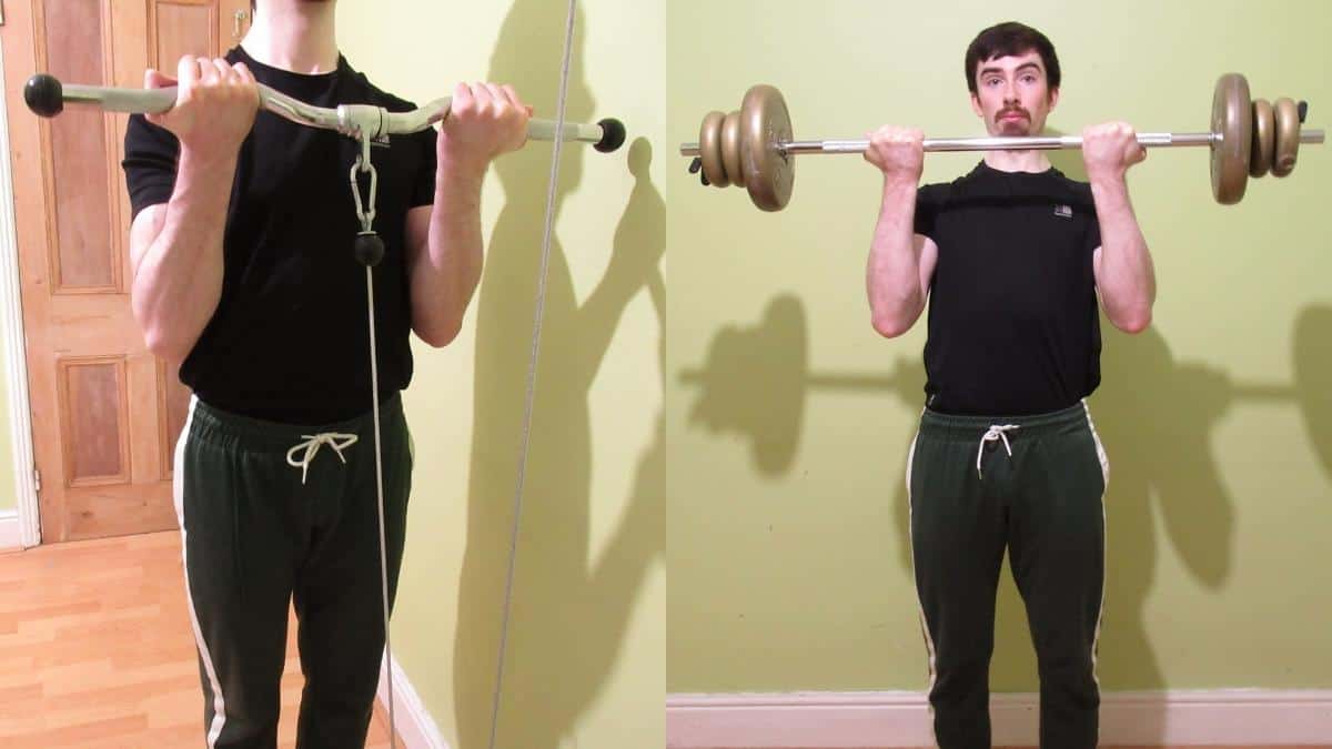 A man doing a cable curls vs barbell curls comparison to show the differences