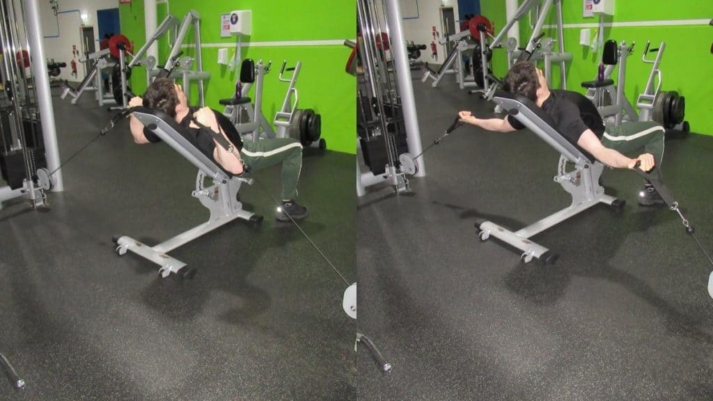 A man doing a cable incline curl