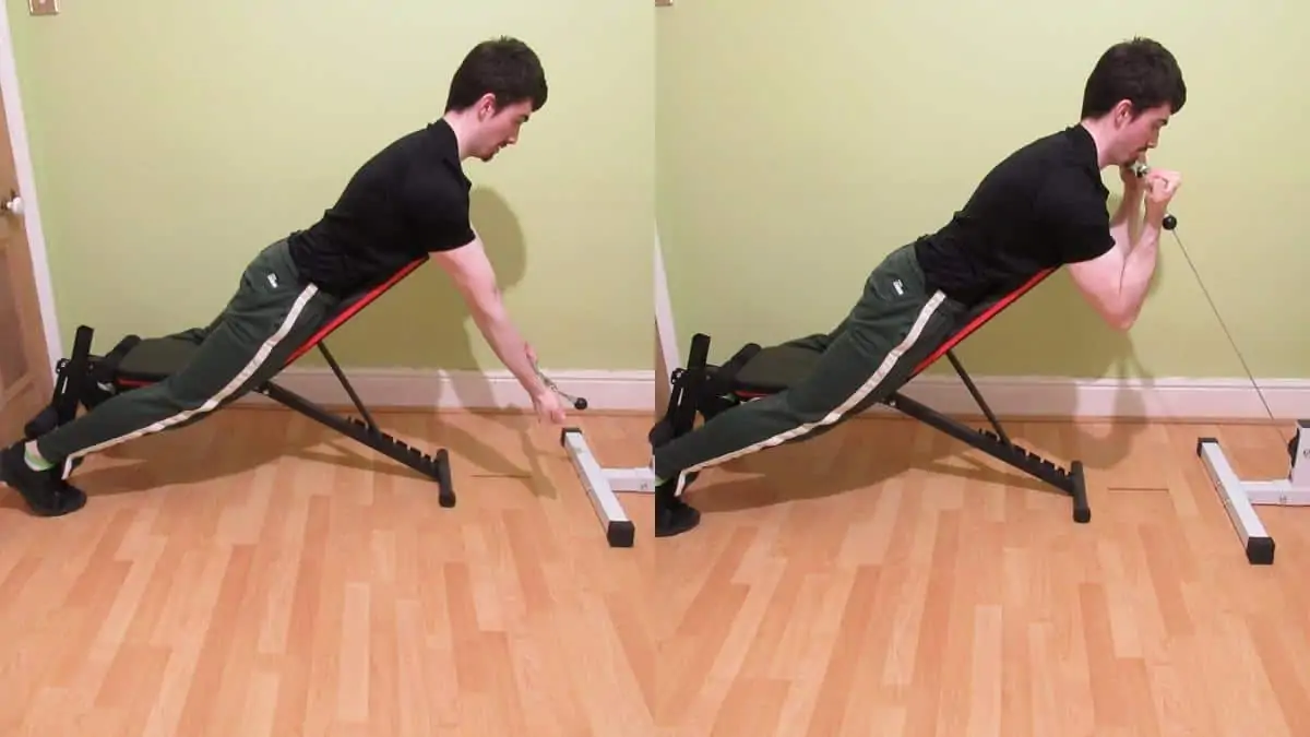 A man doing cable spider curls for his biceps