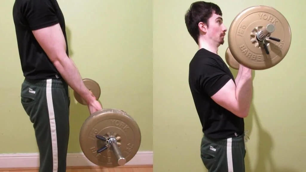 A man doing a close grip barbell curl to work his biceps