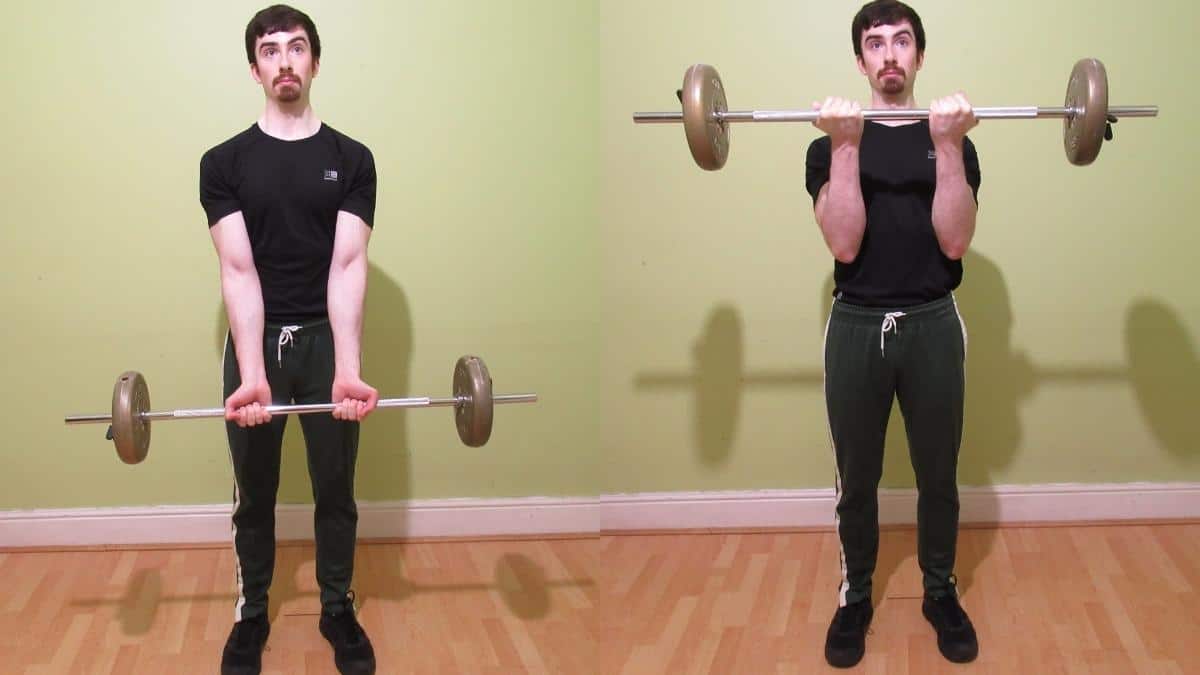 A man performing close grip barbell curls for his biceps