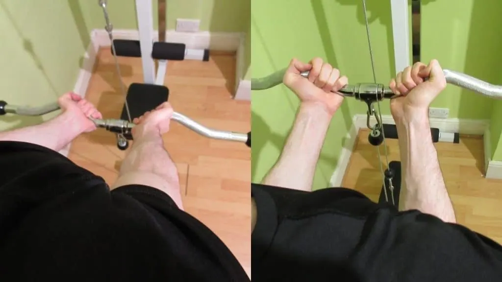 A man doing a close grip EZ bar cable curl