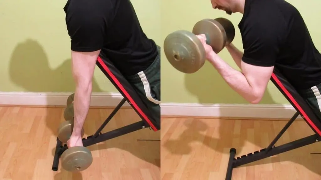 A man doing a decline dumbbell curl for his biceps