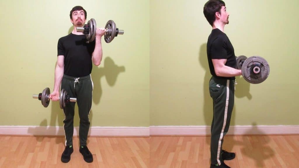A weight lifter performing some dumbbell bicep workouts