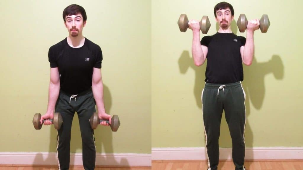 A man performing a dumbbell cheat curl for his biceps