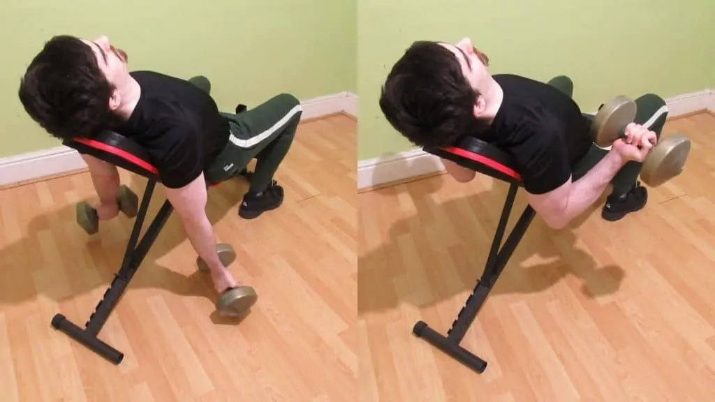 A man performing a dumbbell incline bicep curl