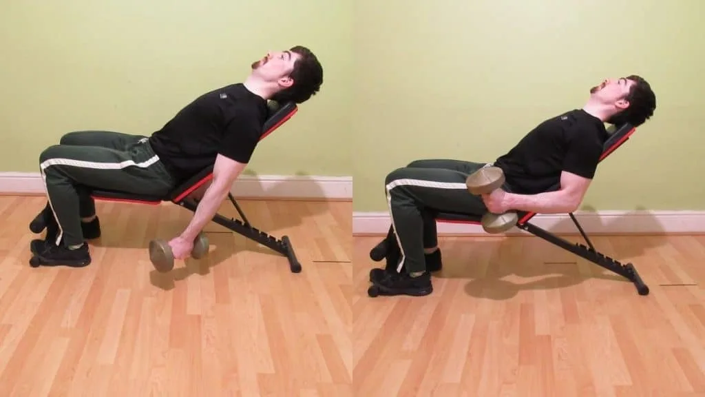 A man performing a dumbbell incline hammer curl