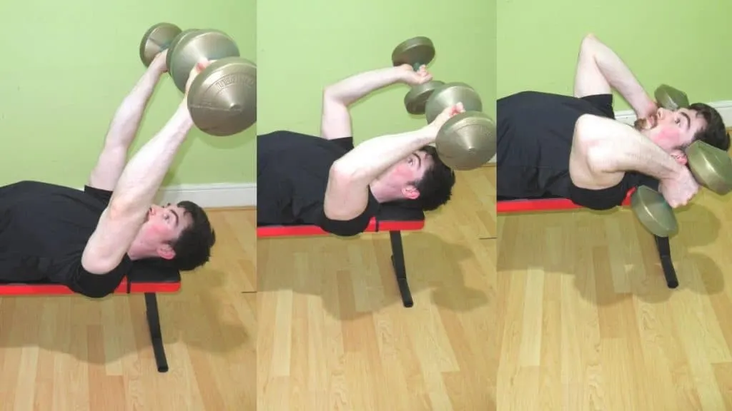 A man doing a dumbbell twist skull crusher