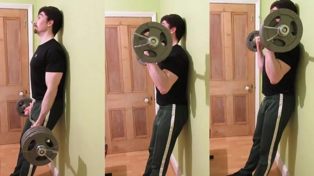 A man doing eccentric standing curls