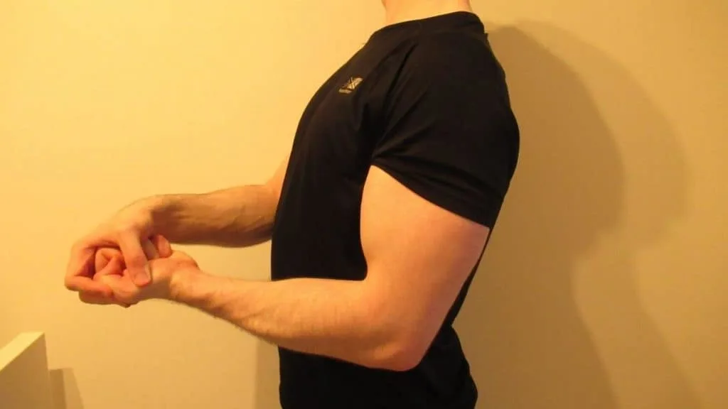 A man flexing his arm