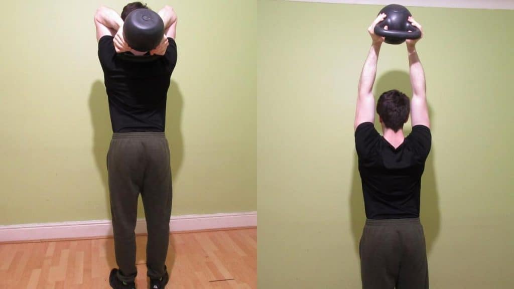 A man performing a French press with a kettlebell