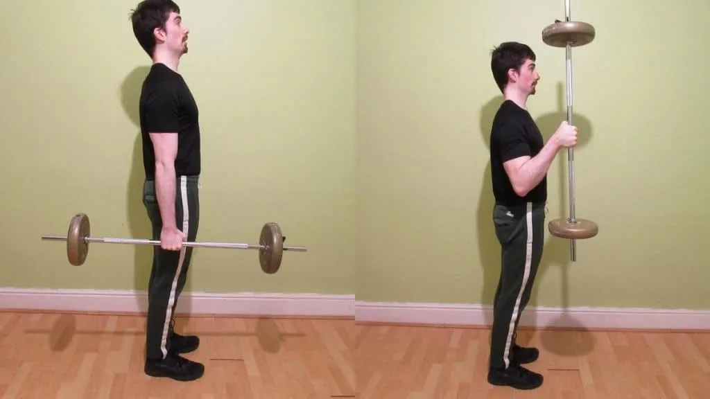 A man doing hammer curls with a barbell