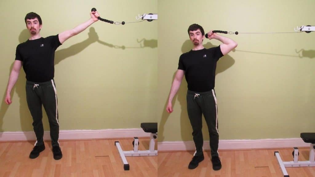A man performing high cable bicep curls