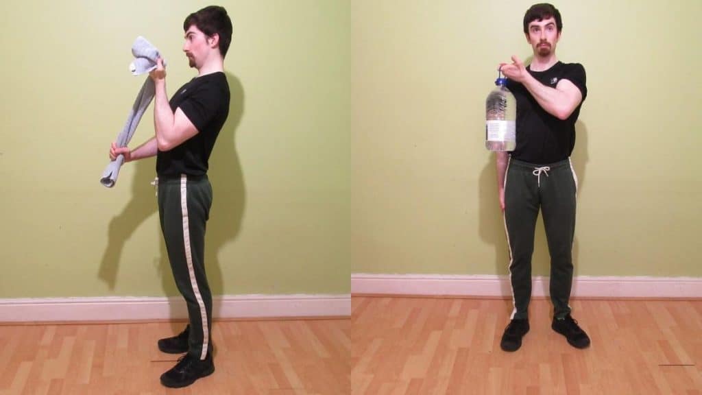 A man showing how to build your biceps without weights and without equipment
