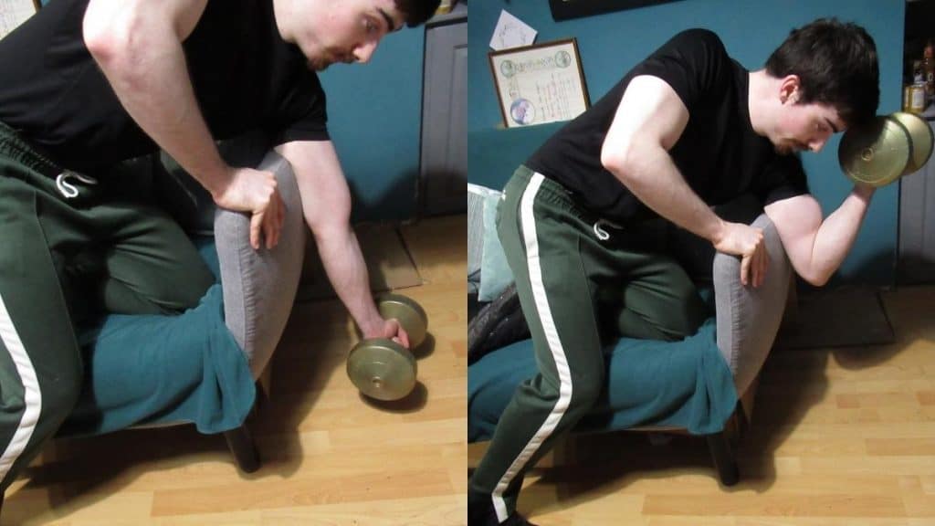 A man showing you how to do preacher curls at home without a bench