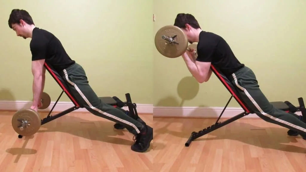 A man performing an incline barbell curl