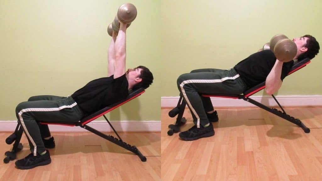 A man performing an incline dumbbell press