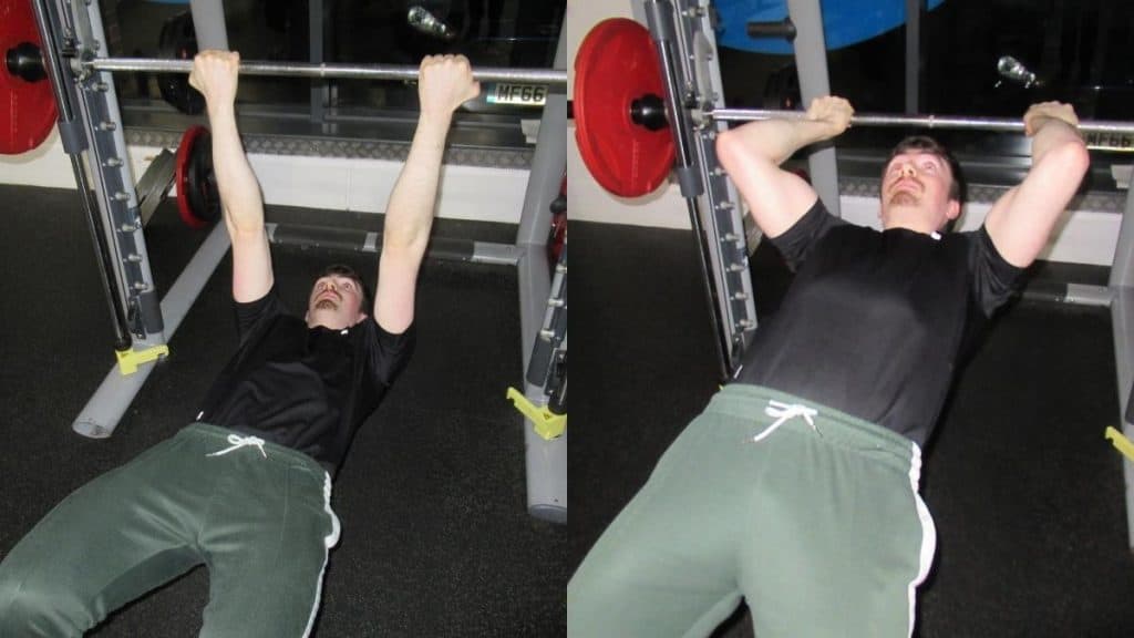 A man doing inverted bicep curls